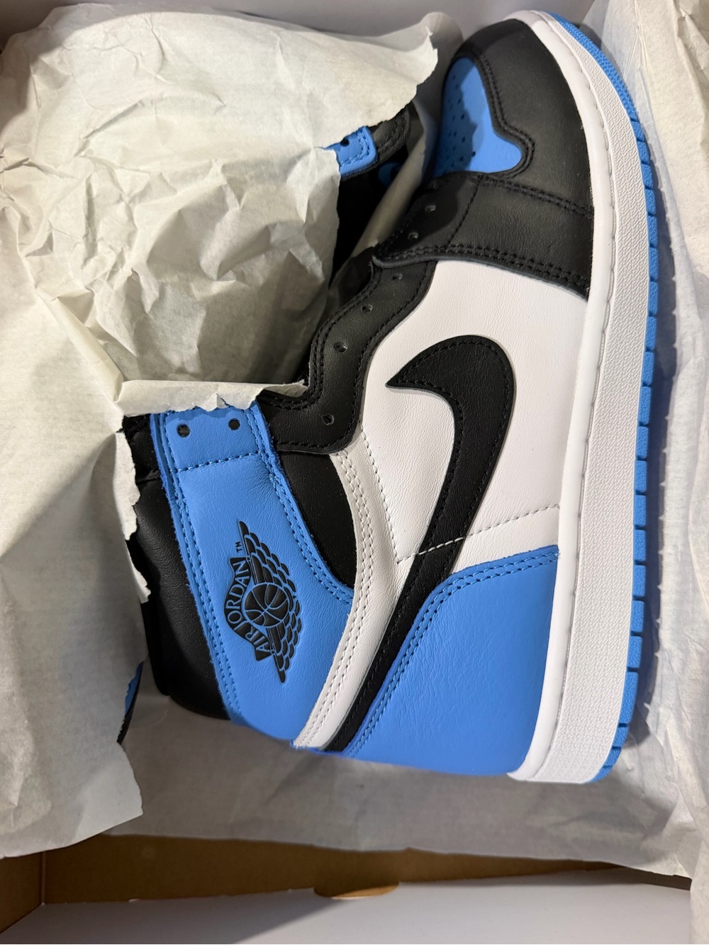 Jordan Men’s High-Top Sneakers in White/Black/University Blue